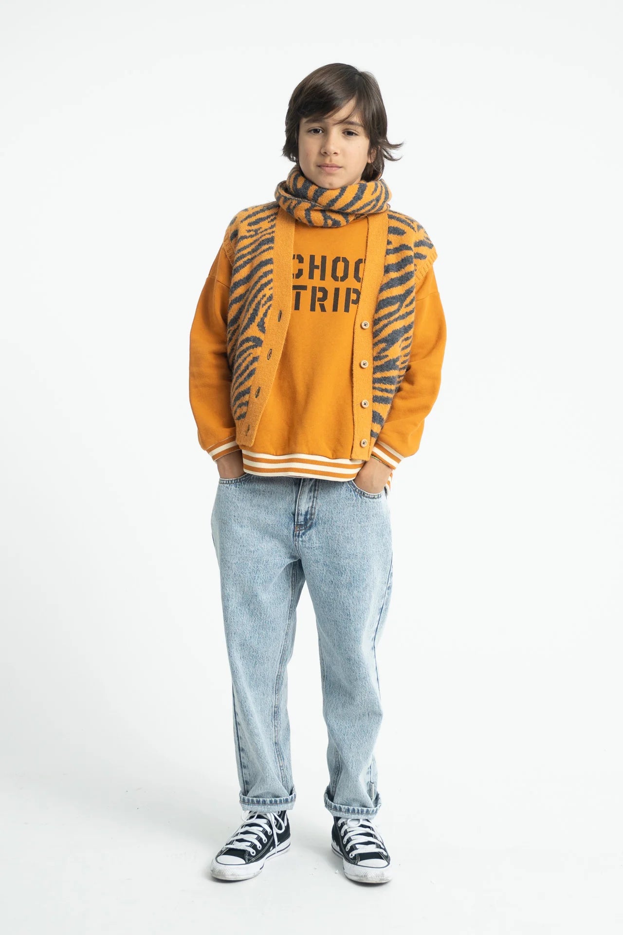 Piupiuchick Knitted waistcoat | orange w/ zebra print