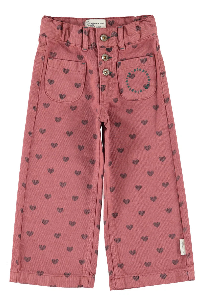 Piupiuchick flare trousers | pink w/ black hearts