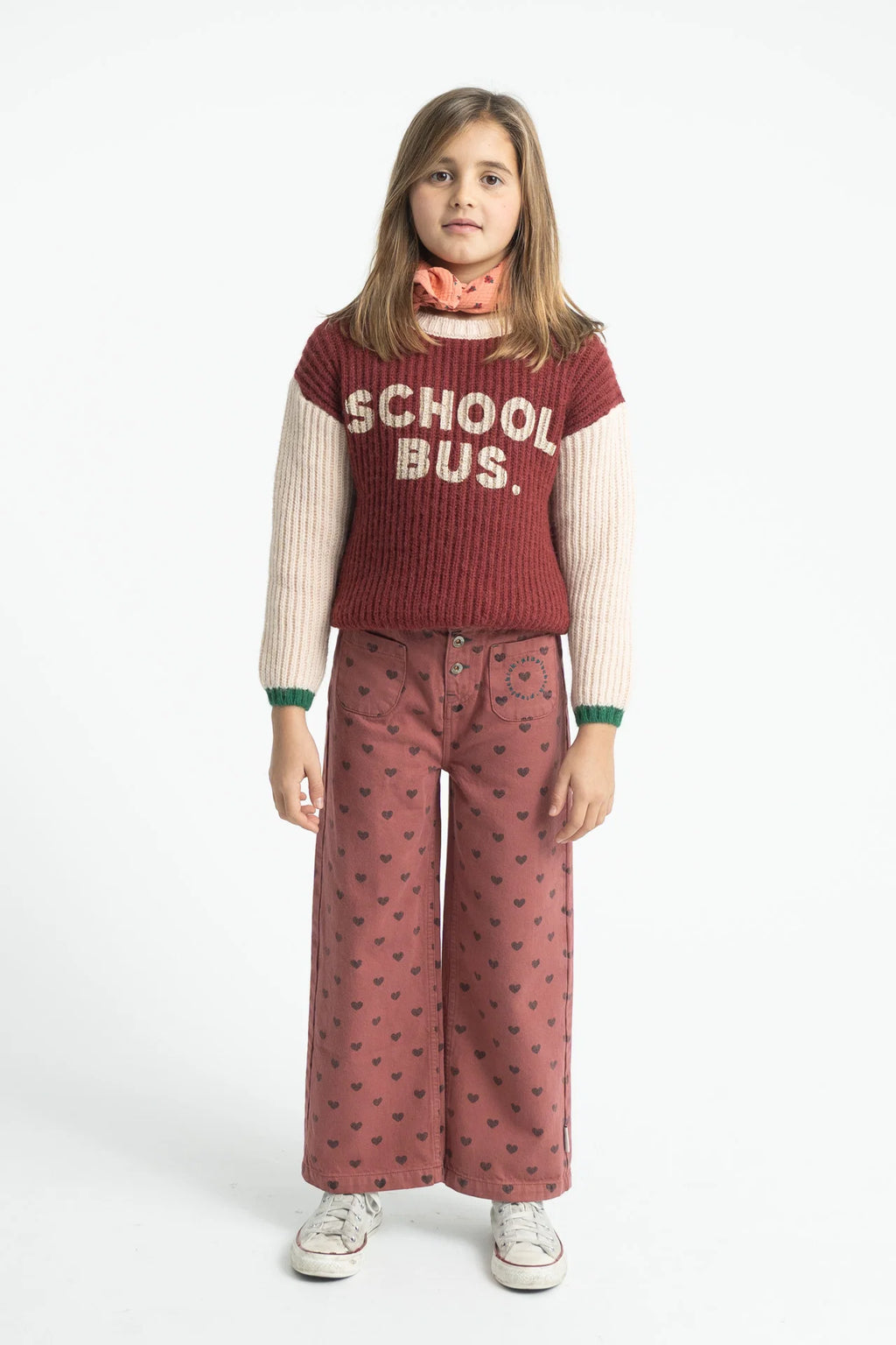 Piupiuchick flare trousers | pink w/ black hearts