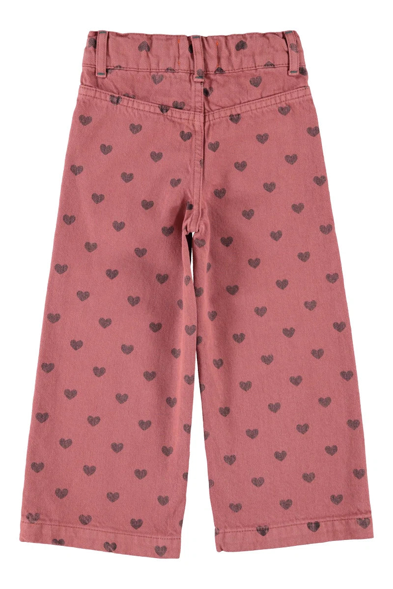 Piupiuchick flare trousers | pink w/ black hearts